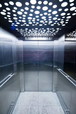 Steel cabin with perforated LED ceiling